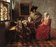 VERMEER VAN DELFT, Jan A Lady Drinking and a Gentleman wr oil painting